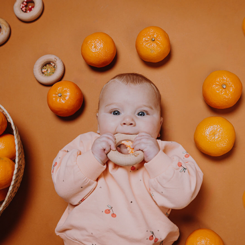 petit boum bijtring en rammelaar donut - sinaasappels